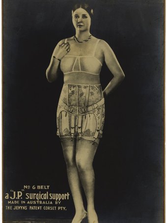Woman wearing a Jenyns surgical support belt ca. 1920