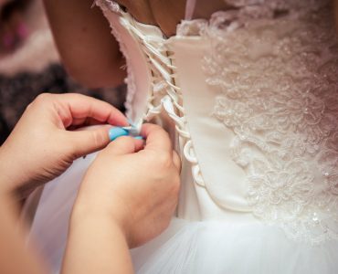 WHAT STYLE OF WEDDING DRESS WOULD BE BEST FOR A SHORT BRIDE?